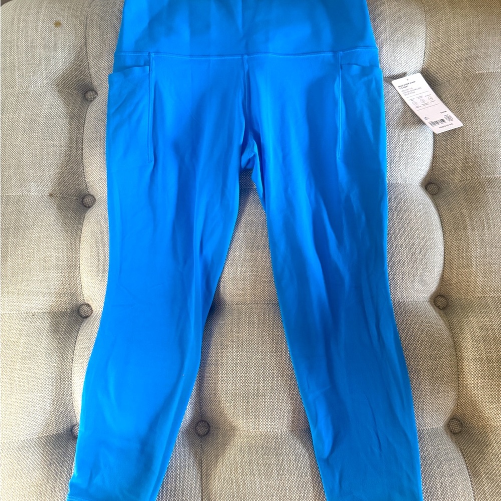 Athleta. Blue salutation stash tight 7/8